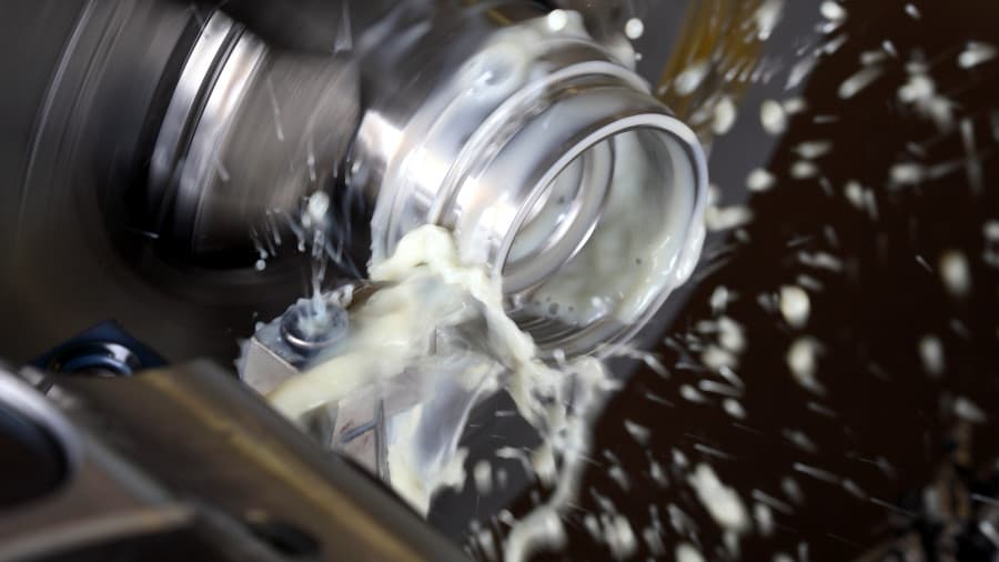 Operation under heavy load with cooling and cutting fluids demands high resistance to oils and chemicals