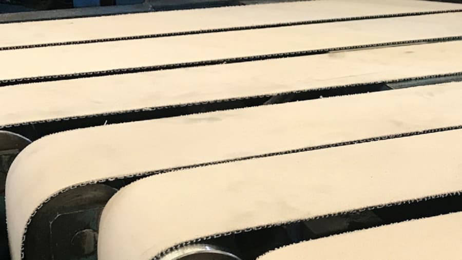 ZIPLINK belts in use at a tire manufacturing plant